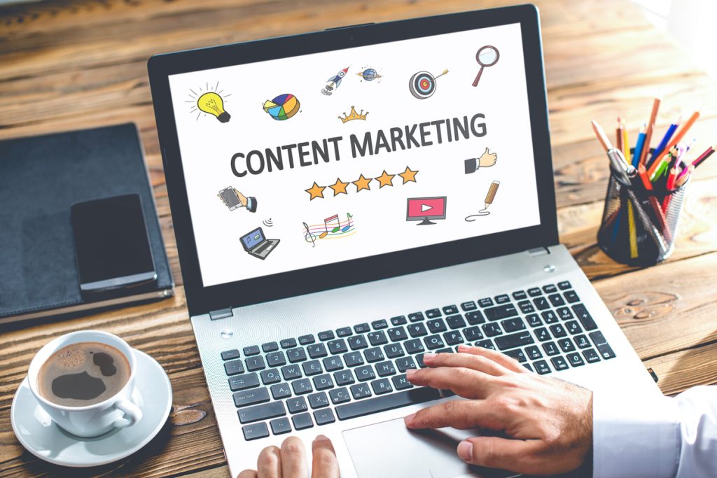 A laptop shows types of content marketing, a vital strategy when figuring out how to find consulting clients.